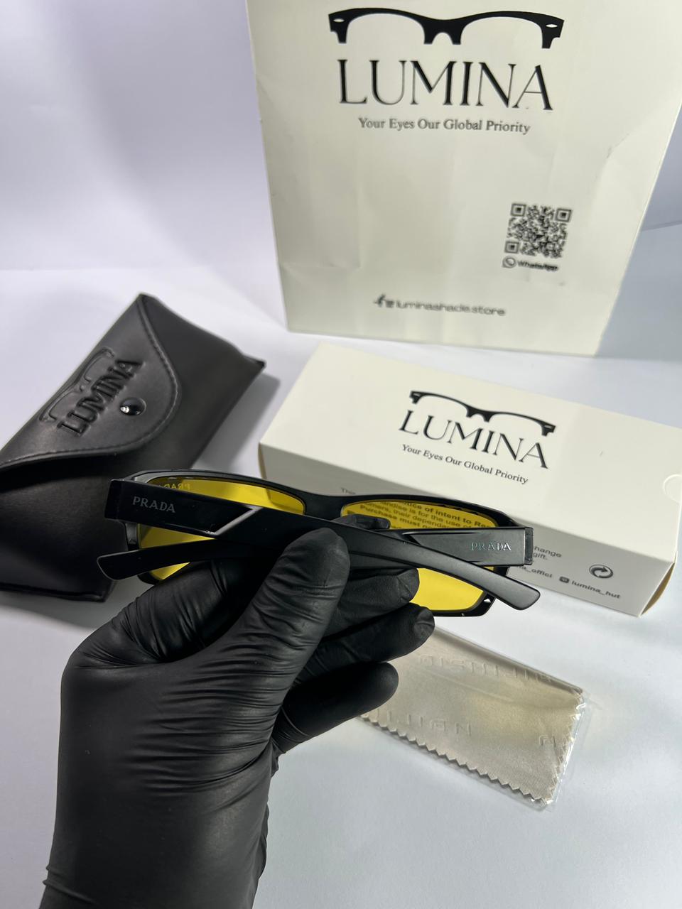 PRADA Bold Black Frames with Striking Yellow Lenses